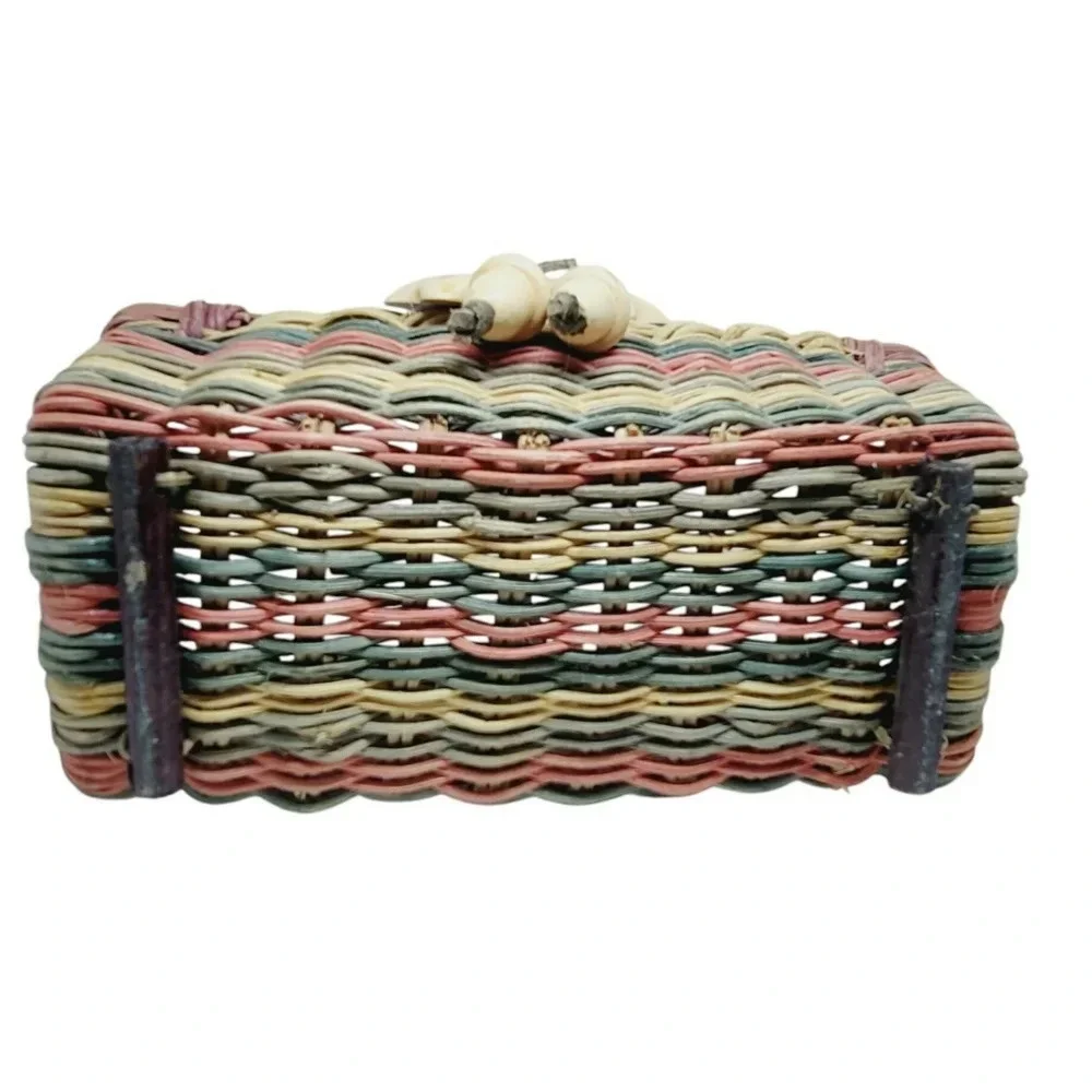 Colored Woven Basket with Wooden Leaves and Acorns Accents